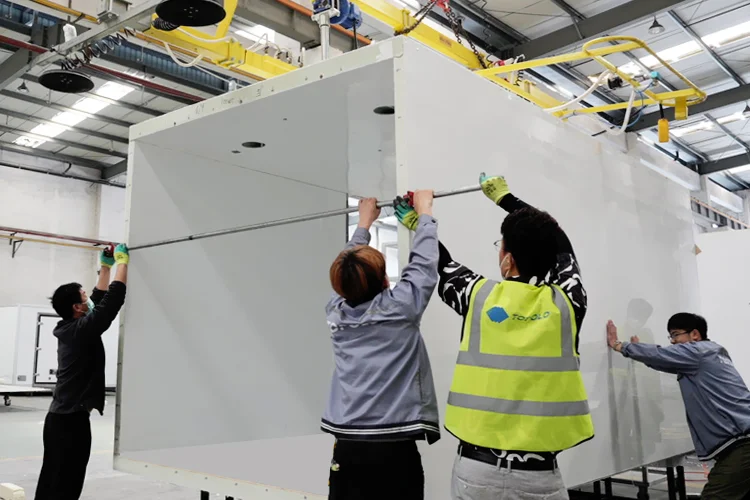 Refrigerated truck body under assembly in the production bay